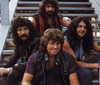 Black Sabbath en 1983 avec Tony Iommi, Geezer Butler, Ian Gillan et Bev Bevan